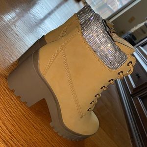 Tan Combat boots with 3 inch heel, 7.5 shoe size, in perfect condition.